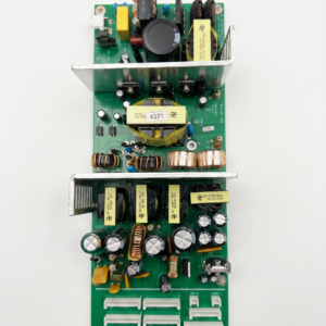 Placa de circuito impresso (PCB) verde, original Behringer PSU-X32-M32, para fonte de alimentação de mixers digitais X32 e Midas M32, apresentando capacitores, transformador, bobinas e conectores visíveis em uma foto de close-up."